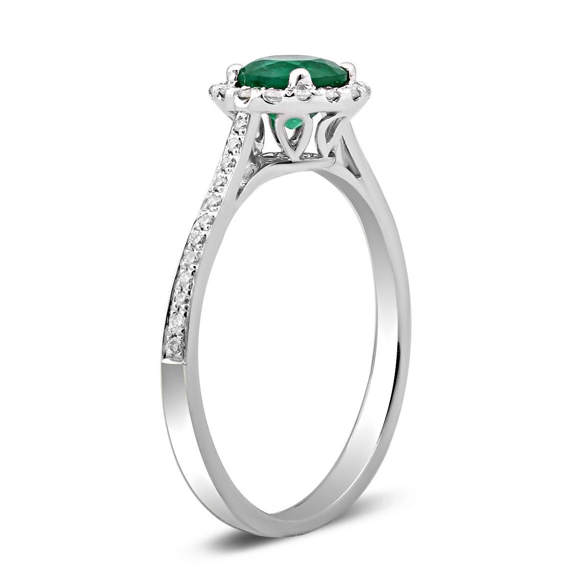 Кольцо из белого золота с бриллиантами и изумрудом (024348)